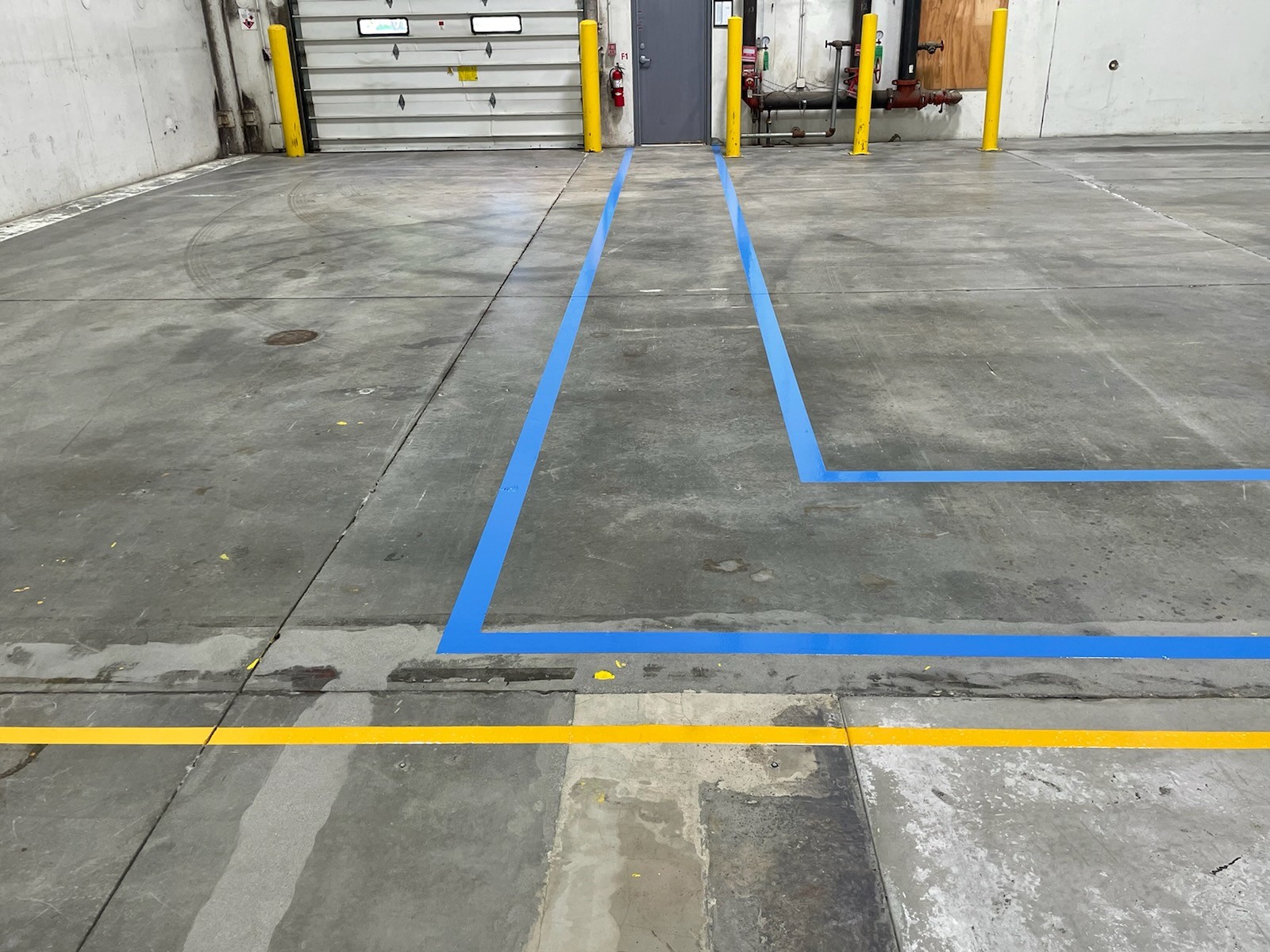 blue and yellow walk aisle for employee safety