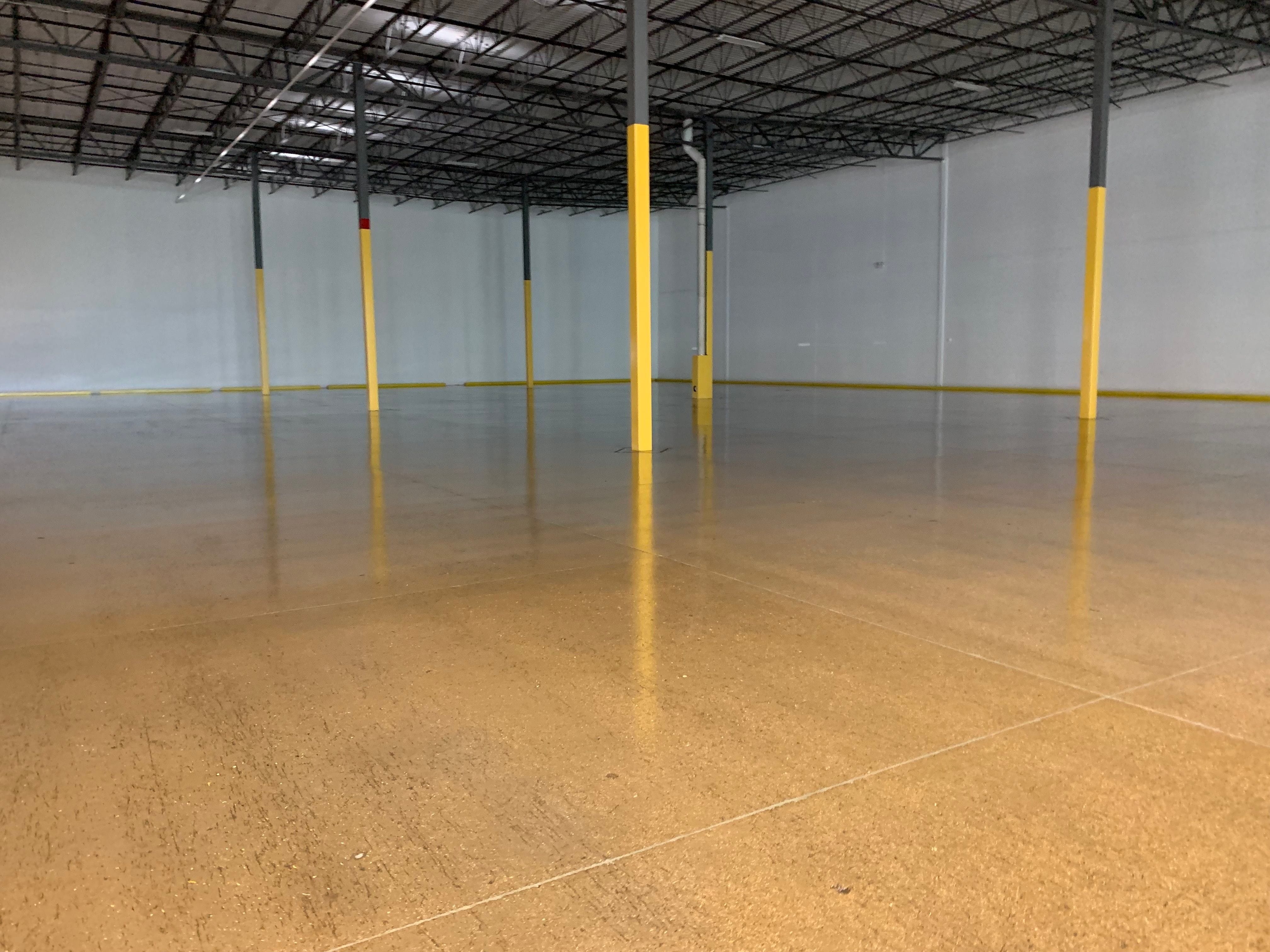 clear epoxy coating in vacant warehouse