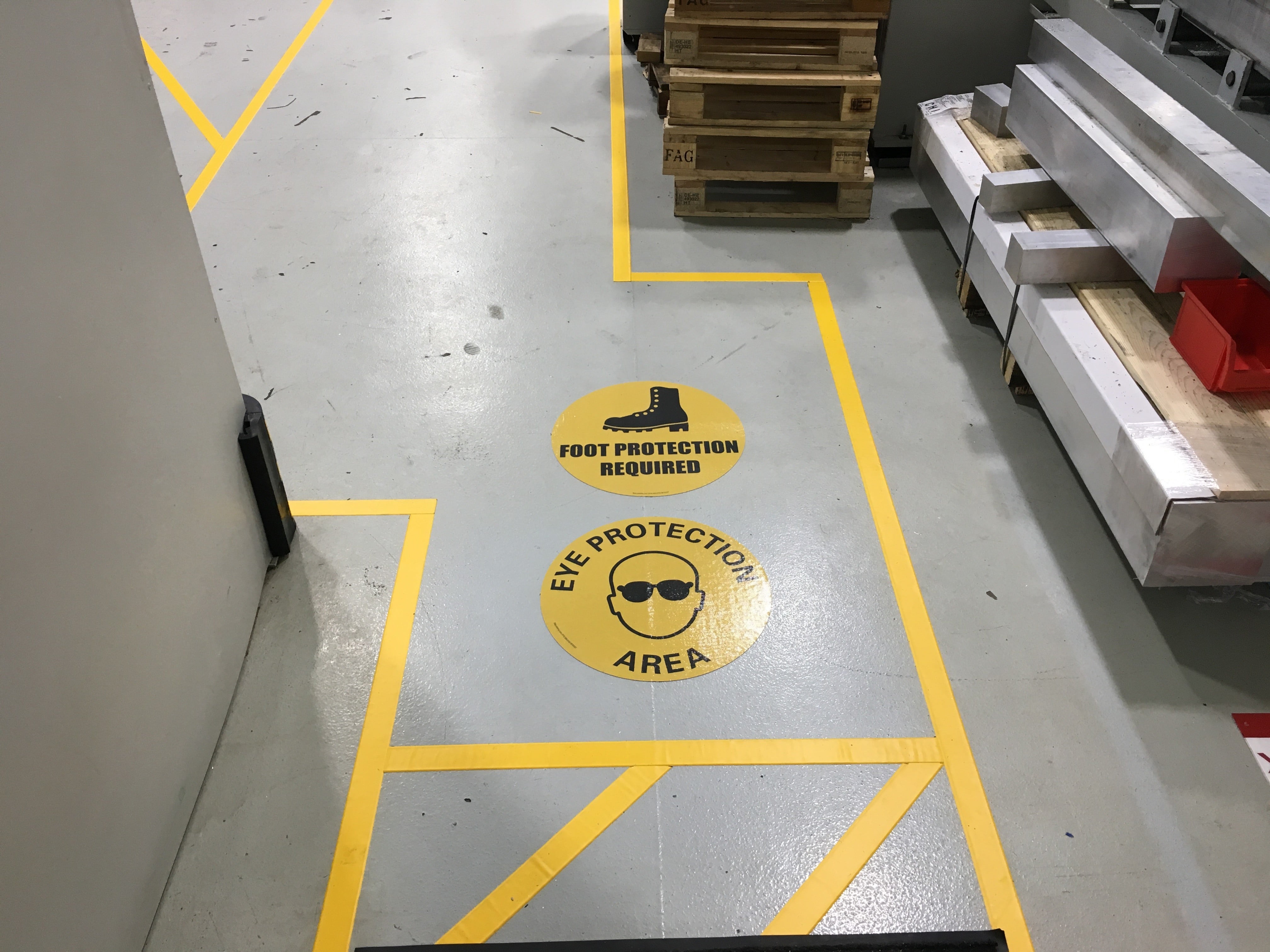 Foot and Eye Protection Warehouse Lable on floor