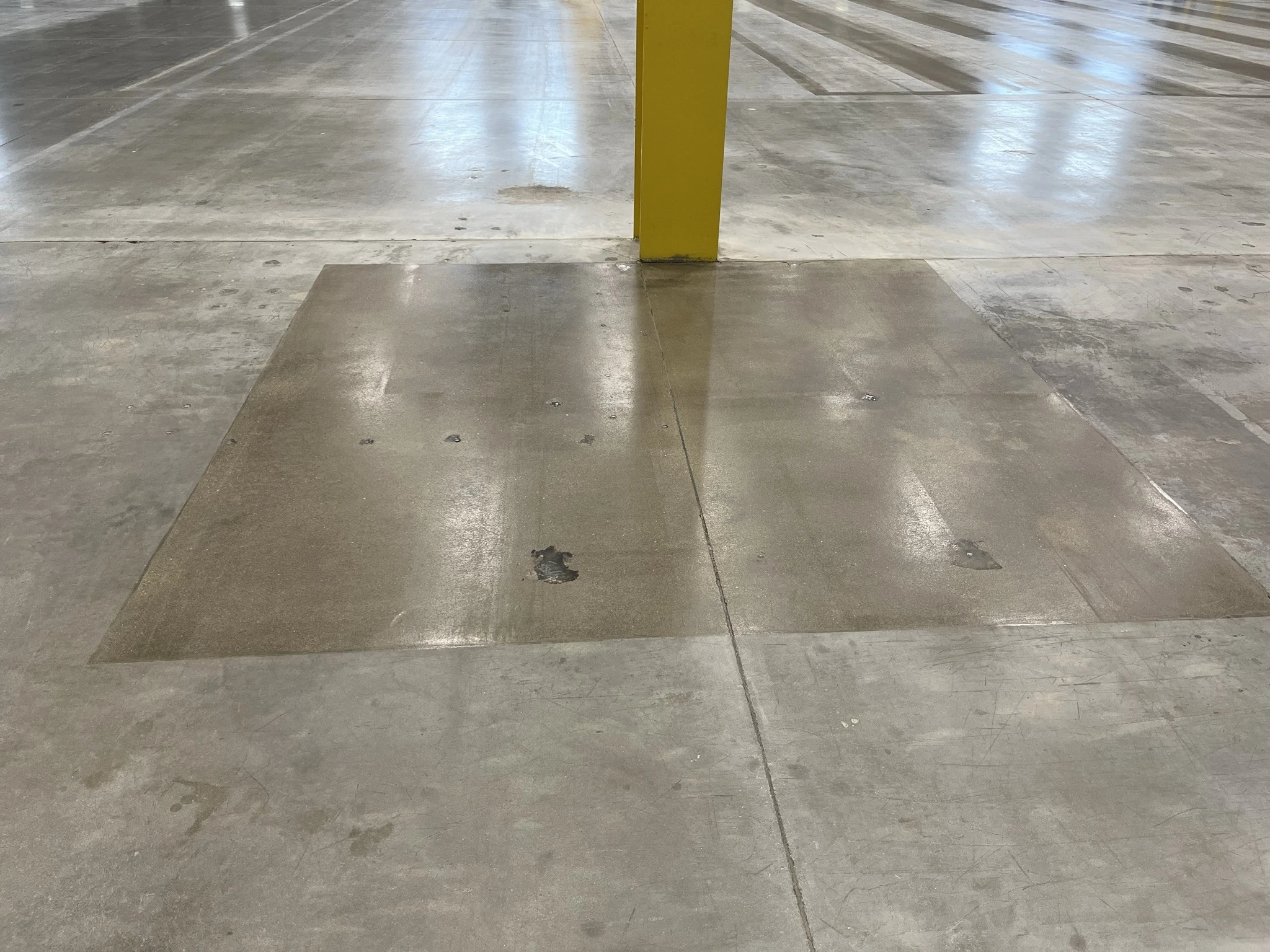 ground acid damage with coating to seal the floor back up