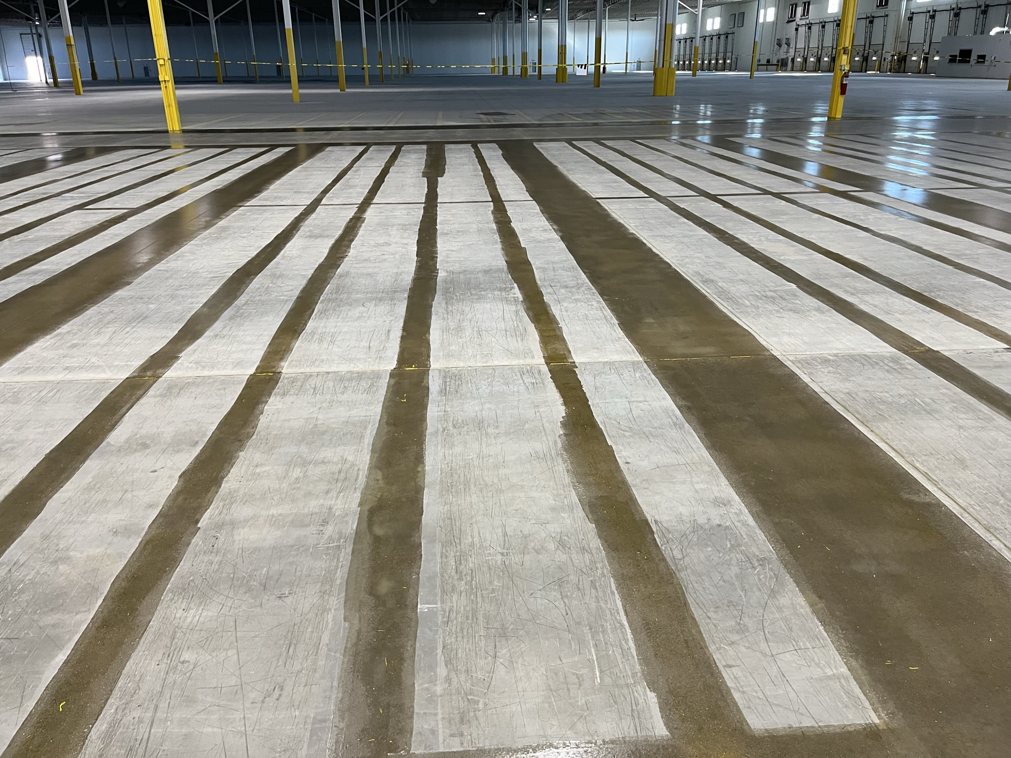 ground lines with coating to seal floor back up